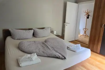 Ein Bett oder Betten in einem Zimmer der Unterkunft Lakeview Apartment Bregenz Bodensee