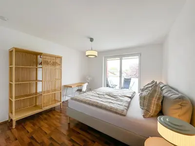 Ein Bett oder Betten in einem Zimmer der Unterkunft Ferienwohnung 