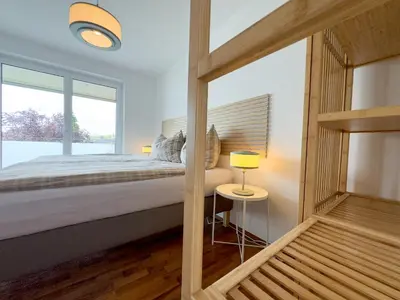 Ein Bett oder Betten in einem Zimmer der Unterkunft Ferienwohnung 