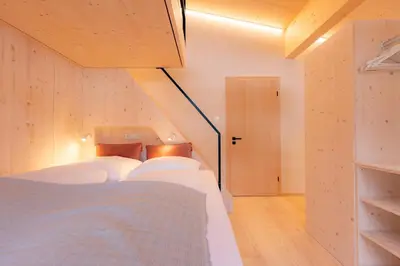 Ein Bett oder Betten in einem Zimmer der Unterkunft Hugo und Pepi Apartments