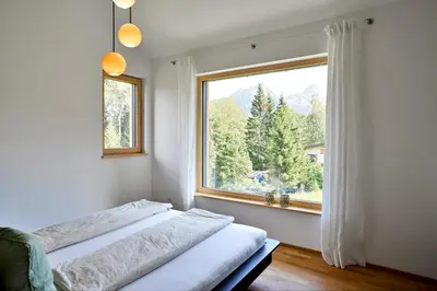 Ein Bett oder Betten in einem Zimmer der Unterkunft Hus154 Ferienhaus im Brandnertal