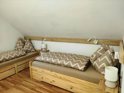 Ein Bett oder Betten in einem Zimmer der Unterkunft Apartment Anna mit Ladestation für E-Autos
