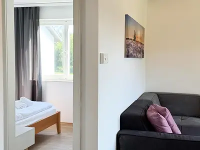 Ein Bett oder Betten in einem Zimmer der Unterkunft Seen- Süchtig Urlaub machen