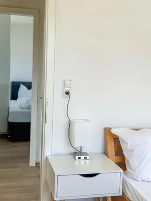 Ein Bett oder Betten in einem Zimmer der Unterkunft Seen- Süchtig Urlaub machen