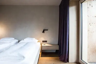 Ein Bett oder Betten in einem Zimmer der Unterkunft Biohotel Schwanen