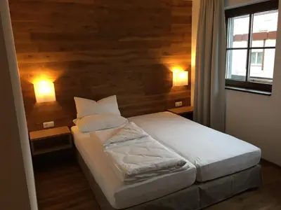 Ein Bett oder Betten in einem Zimmer der Unterkunft Hotel Café Schatz