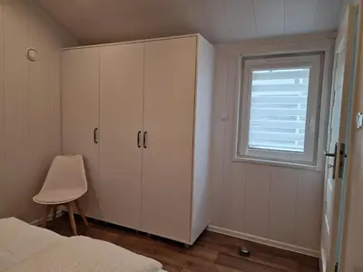 Ein Bett oder Betten in einem Zimmer der Unterkunft Tiny House in schöner Lage