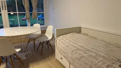 Ein Bett oder Betten in einem Zimmer der Unterkunft Loftwohnung mit Garten
