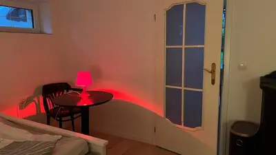 Ein Bett oder Betten in einem Zimmer der Unterkunft Loftwohnung mit Garten