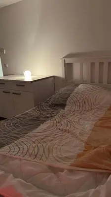 Ein Bett oder Betten in einem Zimmer der Unterkunft Loftwohnung mit Garten