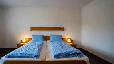 Ein Bett oder Betten in einem Zimmer der Unterkunft Pension Egg'spresso
