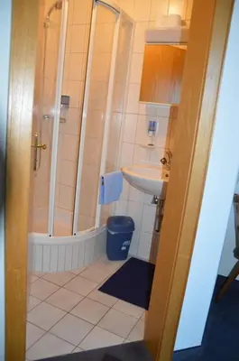 Ein Badezimmer in der Unterkunft Pension Egg'spresso