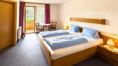 Ein Bett oder Betten in einem Zimmer der Unterkunft Pension Egg'spresso
