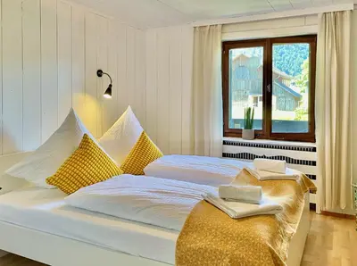 Ein Bett oder Betten in einem Zimmer der Unterkunft Sonnes Apartment