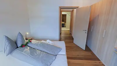 Ein Bett oder Betten in einem Zimmer der Unterkunft alpen select apartments Kleinwalsertal
