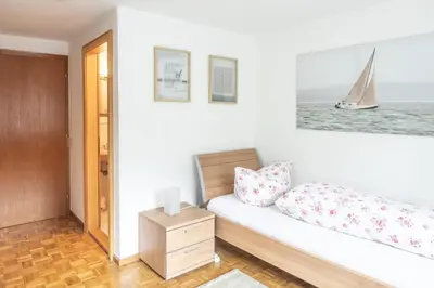 Ein Bett oder Betten in einem Zimmer der Unterkunft Pension Stein nahe Feldkirch ruhige Zimmer für Reisende und Monteure inklusive Frühstück