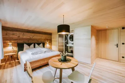 Ein Bett oder Betten in einem Zimmer der Unterkunft Gasthof Adler Schwarzenberg