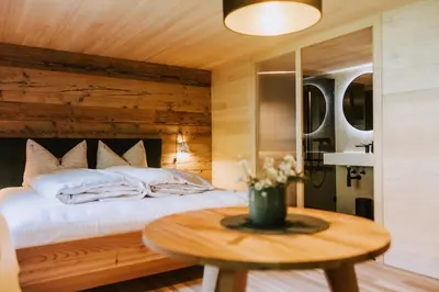 Ein Bett oder Betten in einem Zimmer der Unterkunft Gasthof Adler Schwarzenberg