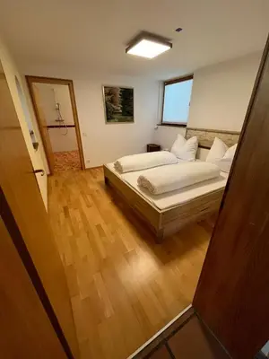 Ein Bett oder Betten in einem Zimmer der Unterkunft Ferienwohnung Hohenweiler