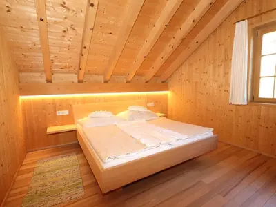 Ein Bett oder Betten in einem Zimmer der Unterkunft Reich
