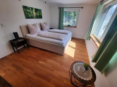 Ein Bett oder Betten in einem Zimmer der Unterkunft Apartment Prinzip Hoffnung