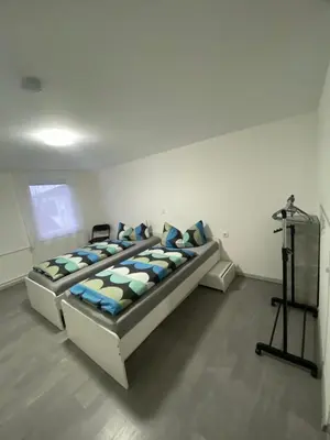 Ein Bett oder Betten in einem Zimmer der Unterkunft Kovacevic Rooms