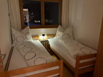 Ein Bett oder Betten in einem Zimmer der Unterkunft Ferienwohnung Nardin