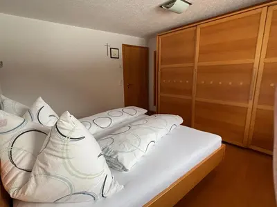 Ein Bett oder Betten in einem Zimmer der Unterkunft Ferienwohnung Nardin