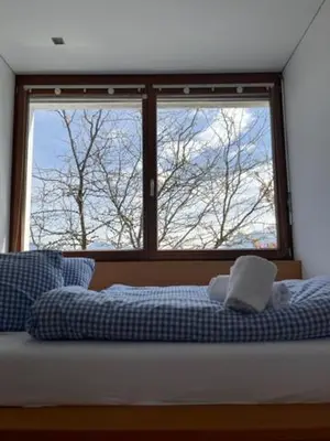 Ein Bett oder Betten in einem Zimmer der Unterkunft Villa Noomi