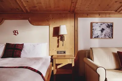 Ein Bett oder Betten in einem Zimmer der Unterkunft Burg Hotel Lech am Arlberg