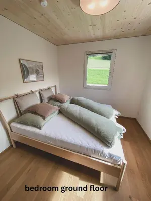 Ein Bett oder Betten in einem Zimmer der Unterkunft Refugium im Wald