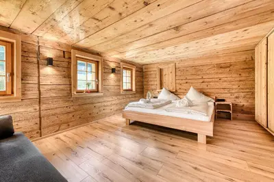 Ein Bett oder Betten in einem Zimmer der Unterkunft Berghaus Lutzklang