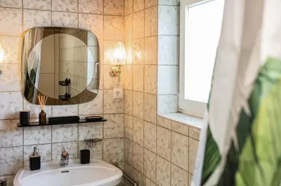 Ein Badezimmer in der Unterkunft Seeperle Lochau - Der See ruft!