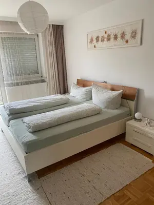 Ein Bett oder Betten in einem Zimmer der Unterkunft Haus mit schönem Garten