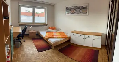 Ein Bett oder Betten in einem Zimmer der Unterkunft Haus mit schönem Garten