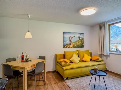Ein Sitzbereich in der Unterkunft Ferienwohnung 5-Täler