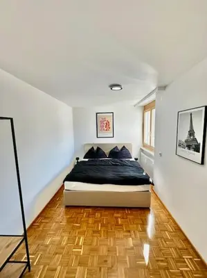 Ein Bett oder Betten in einem Zimmer der Unterkunft Schickes Wohnen in top Lage