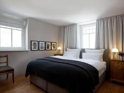 Ein Bett oder Betten in einem Zimmer der Unterkunft Boutique Apartments Bezau