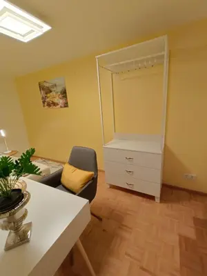 Ein Sitzbereich in der Unterkunft Luxus Apartment KFJ