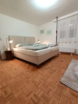 Ein Bett oder Betten in einem Zimmer der Unterkunft Luxus Apartment KFJ