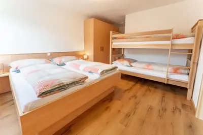 Ein Bett oder Betten in einem Zimmer der Unterkunft Ferienwohnung Talblick