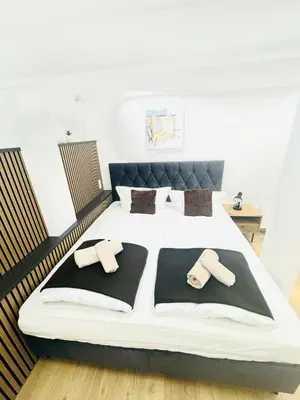 Ein Bett oder Betten in einem Zimmer der Unterkunft Ferienwohnung Wanderlust