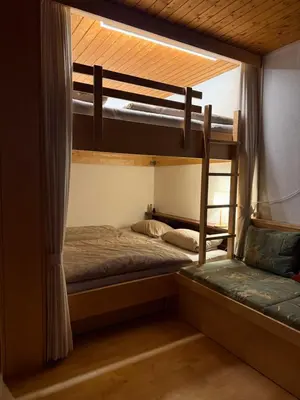 Ein Bett oder Betten in einem Zimmer der Unterkunft BergNest Brandnertal
