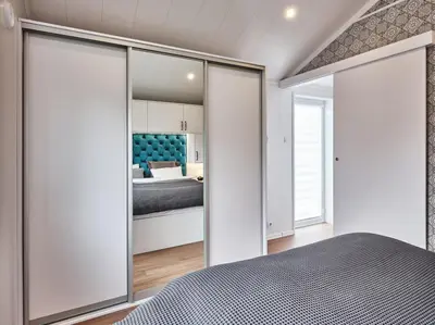 Ein Bett oder Betten in einem Zimmer der Unterkunft WohnBox Chaletpark