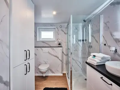 Ein Badezimmer in der Unterkunft WohnBox Chaletpark