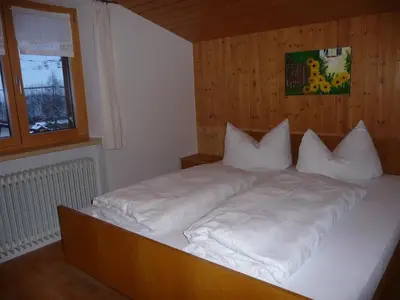 Ein Bett oder Betten in einem Zimmer der Unterkunft Ferienwohnung Natter in Mellau