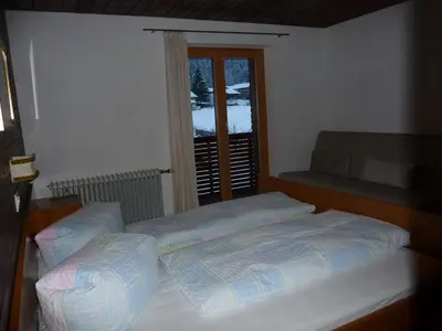 Ein Bett oder Betten in einem Zimmer der Unterkunft Ferienwohnung Natter in Mellau