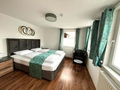 Ein Bett oder Betten in einem Zimmer der Unterkunft COVE Appart