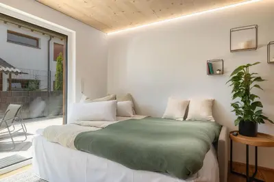 Ein Bett oder Betten in einem Zimmer der Unterkunft KopfRausch Appartements