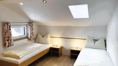 Ein Bett oder Betten in einem Zimmer der Unterkunft Haus Oberluggauer